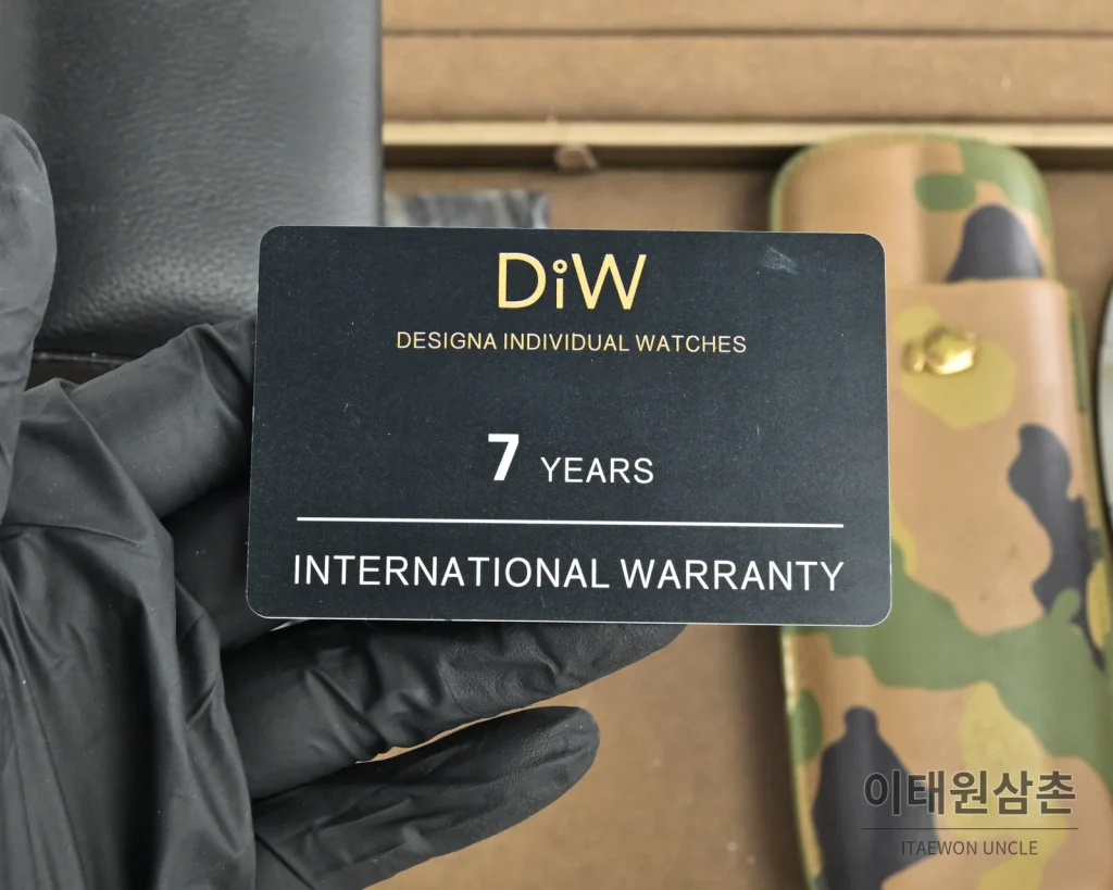 오데마피게 로열오크 오토매틱 41mm 그레이 다이얼 블랙 러버 스트랩 블랙 베젤