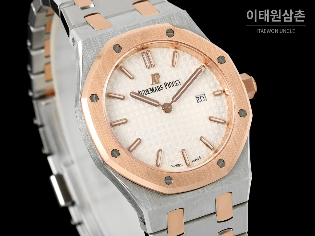오데마피게 로열오크 스와로브스키 베젤 그랑 타피스리 쿼츠 33mm 67651OR 화이트 다이얼 투톤 브레이슬릿