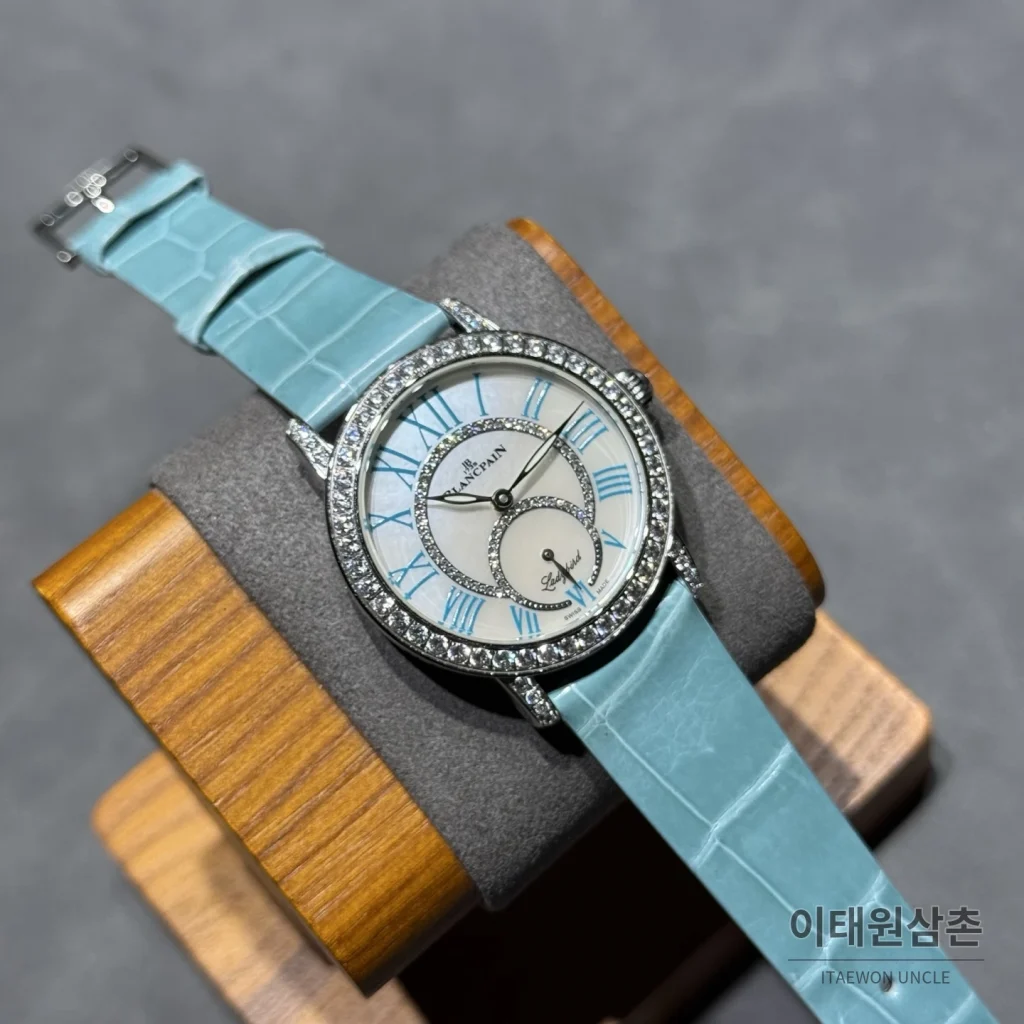블랑팡 다이아몬드 볼 오토매틱 34.9mm 자개 다이얼 아이스블루 가죽 스트랩 실버 베젤