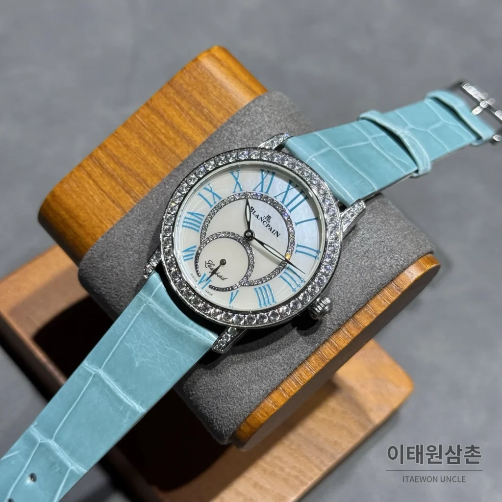 블랑팡 다이아몬드 볼 오토매틱 34.9mm 자개 다이얼 아이스블루 가죽 스트랩 실버 베젤