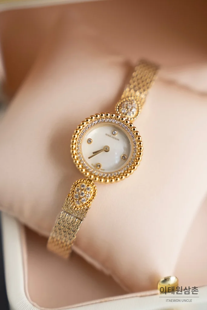 부쉐론 세르펭 보헴 골드베젤 화이트다이얼 쿼츠 워치 23mm (2)