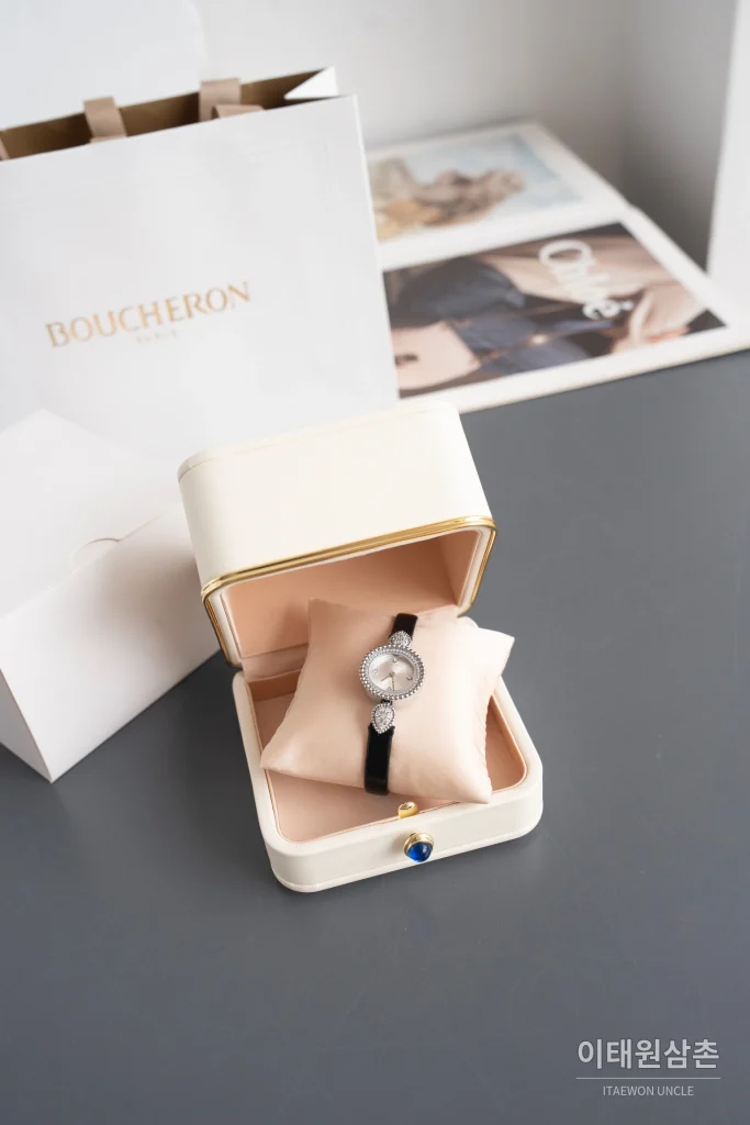 부쉐론 세르펭 보헴 자개다이얼 모이사나이트 쿼츠 워치 23mm 블랙 가죽 스트랩 화이트 베젤
