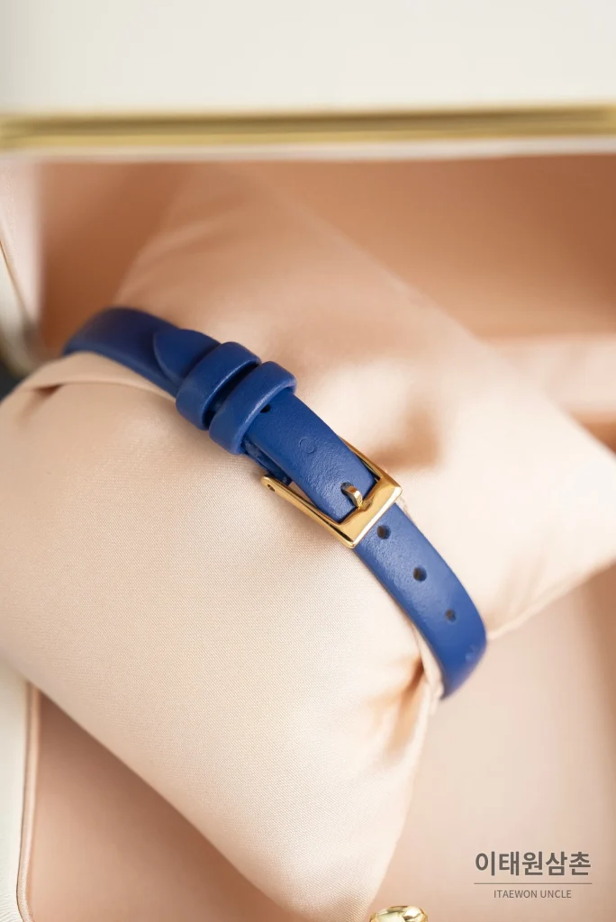 부쉐론 세르펭 보헴 자개다이얼 모이사나이트 쿼츠 워치 23mm 블루 가죽 스트랩 골드 베젤