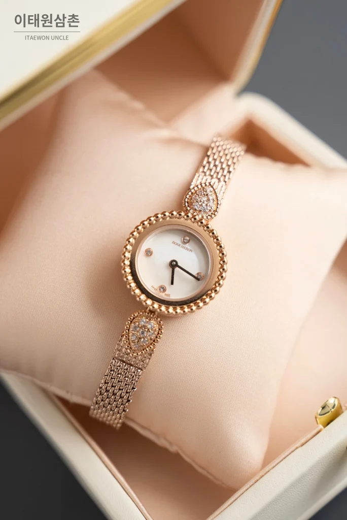 부쉐론 세르펭 보헴 로즈골드베젤 화이트다이얼 쿼츠 워치 23mm