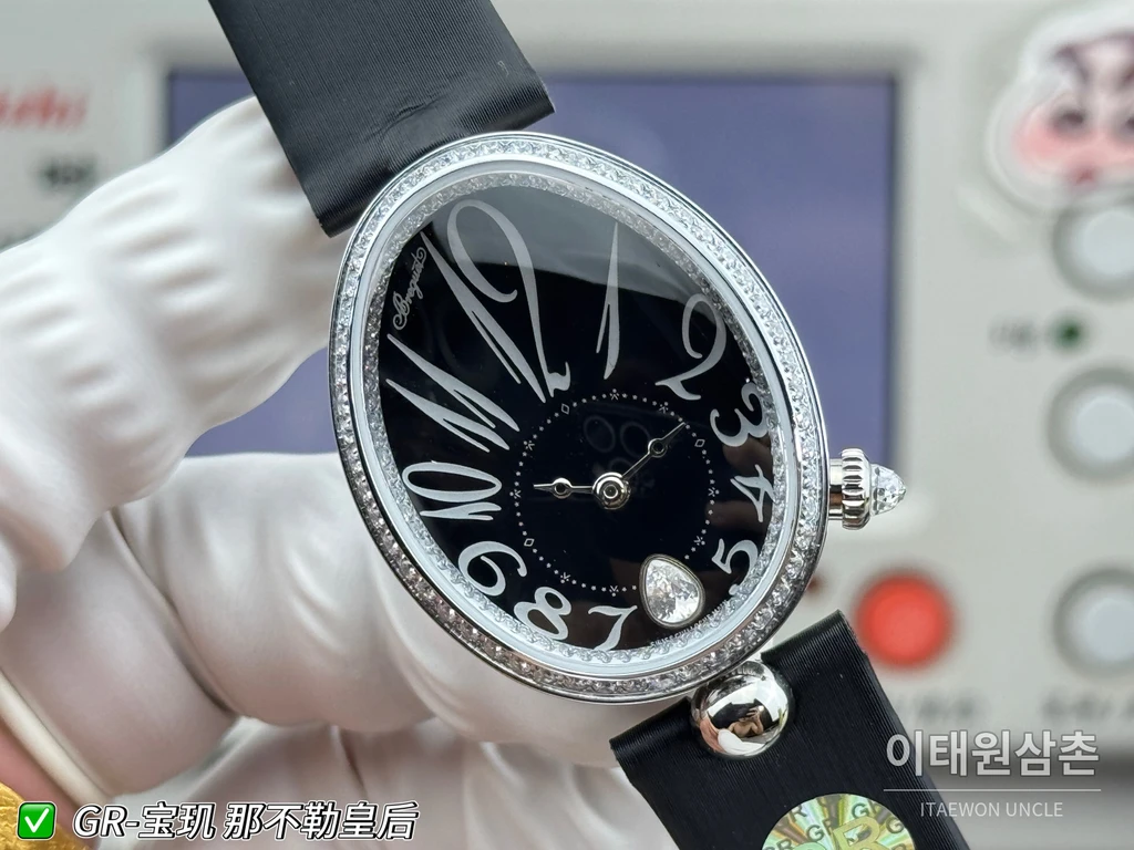 브레게 레인 드 네이플 실버 크리스탈 베젤 블랙 다이얼 스트랩 시계 36mm