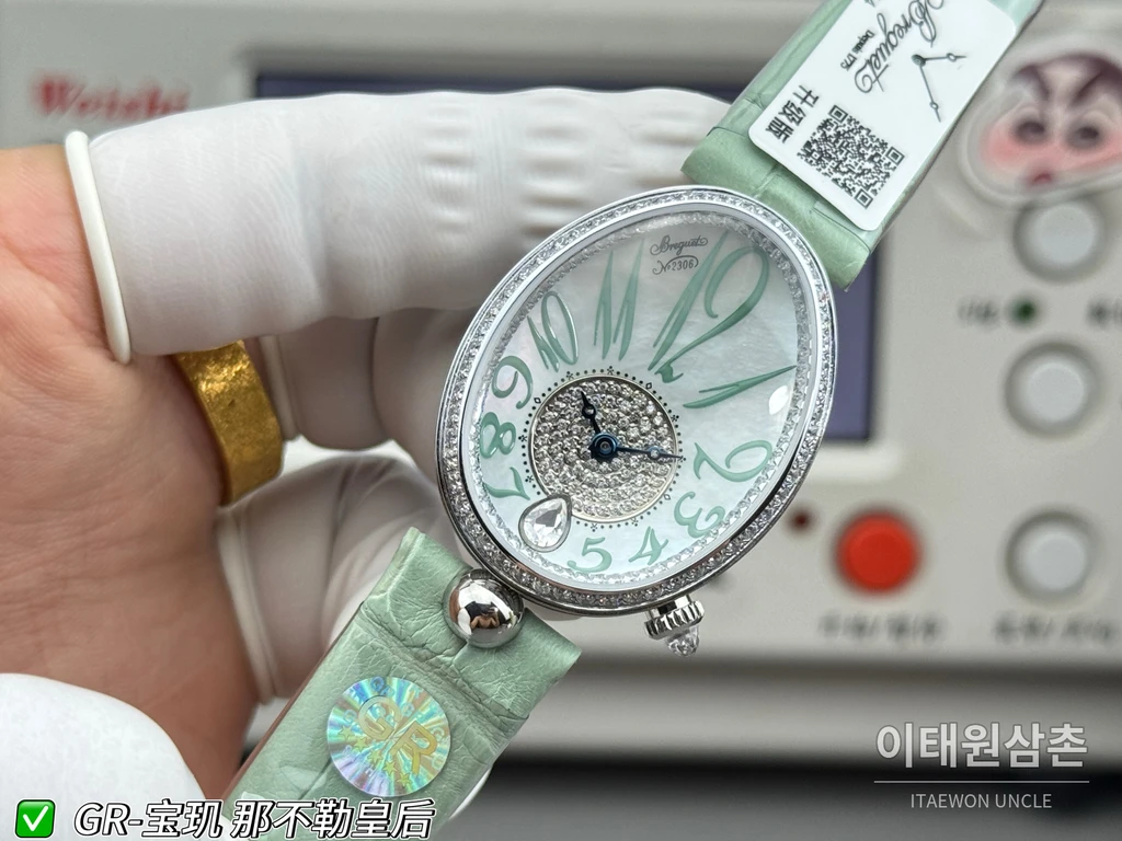 브레게 레인 드 네이플 실버 크리스탈 베젤 화이트 다이얼 민트 그린 스트랩 시계 36mm