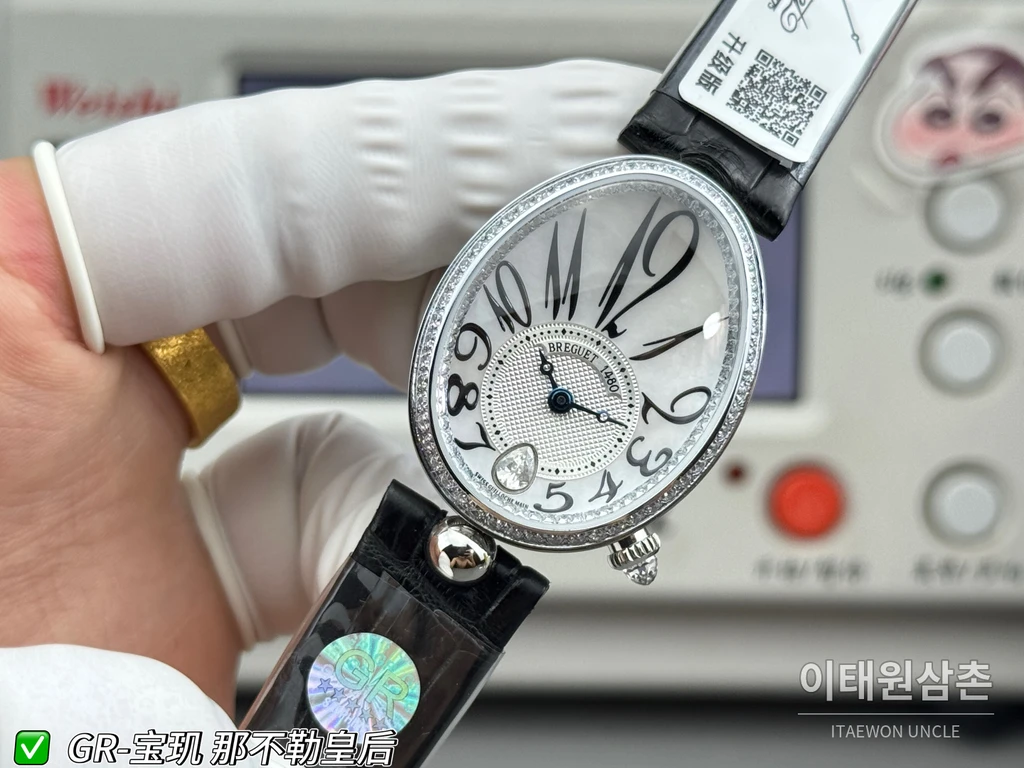 브레게 레인 드 네이플 실버 크리스탈 베젤 화이트 다이얼 블랙 스트랩 시계 36mm