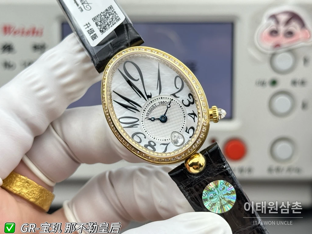 브레게 레인 드 네이플 옐로우골드톤 크리스탈 베젤 화이트 다이얼 블랙 스트랩 시계 36mm