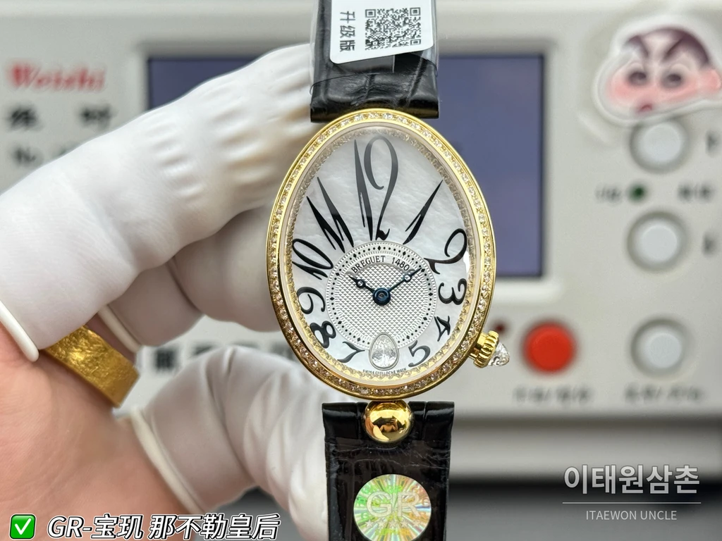 브레게 레인 드 네이플 옐로우골드톤 크리스탈 베젤 화이트 다이얼 블랙 스트랩 시계 36mm