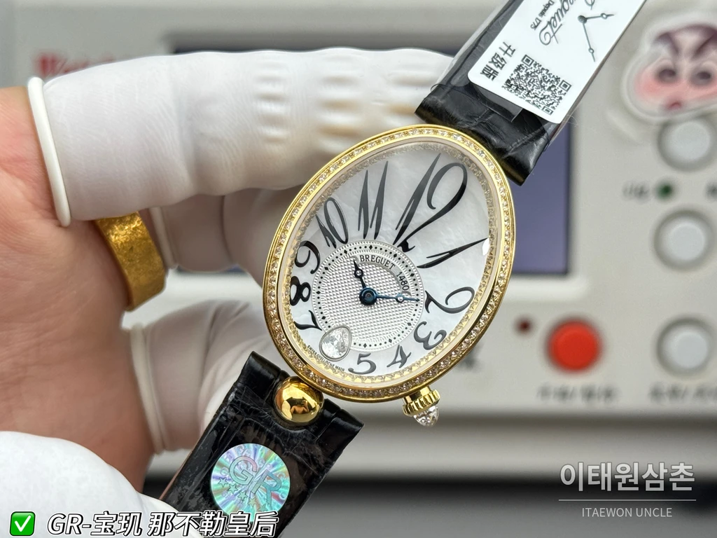 브레게 레인 드 네이플 옐로우골드톤 크리스탈 베젤 화이트 다이얼 블랙 스트랩 시계 36mm