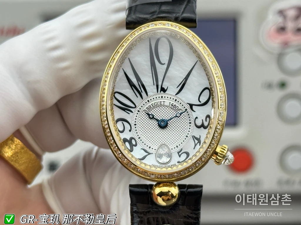 브레게 레인 드 네이플 옐로우골드톤 크리스탈 베젤 화이트 다이얼 블랙 스트랩 시계 36mm