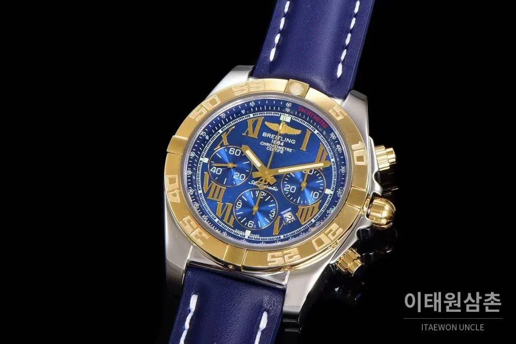 브라이틀링 크로노맷 스틸 블루다이얼 크로노그래프 오토매틱 44mm 네이비 가죽 스트랩 골드 베젤