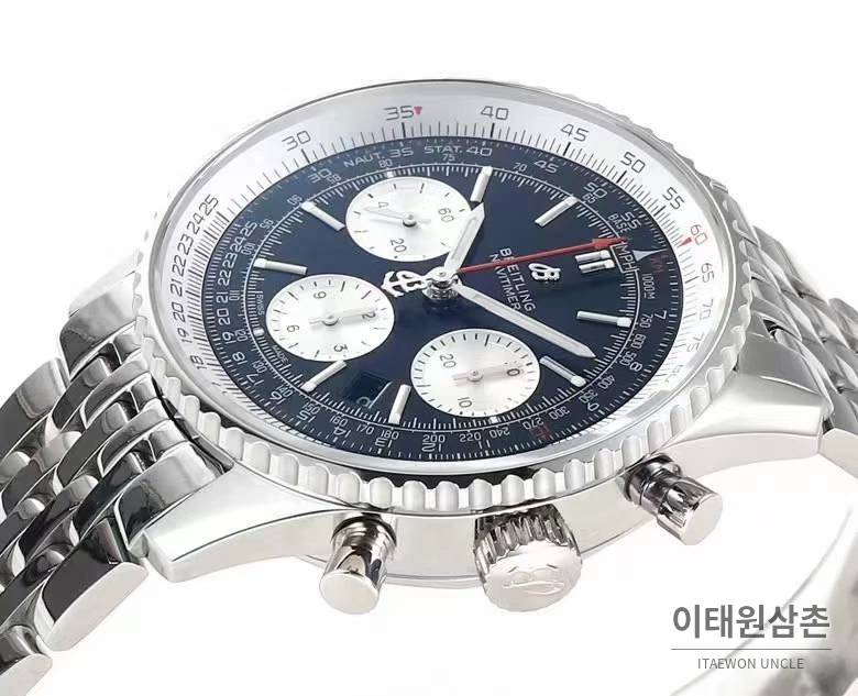 브라이틀링 내비타이머1 B01 스틸 슬라이드룰베젤 크로노그래프 오토매틱 43mm 네이비 다이얼 스틸 브레이슬릿