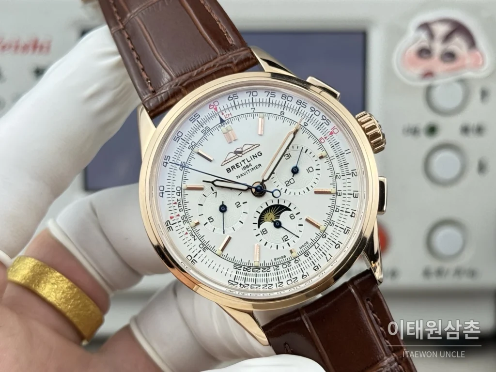 브라이틀링 내비타이머 크로노그래프 가죽스트랩 오토매틱 42mm 블랙 로즈골드 베젤