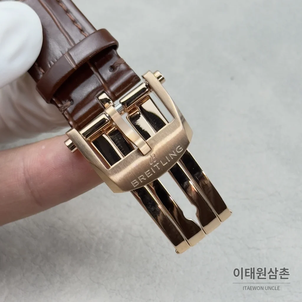 브라이틀링 내비타이머 크로노그래프 가죽스트랩 오토매틱 42mm 블랙 로즈골드 베젤