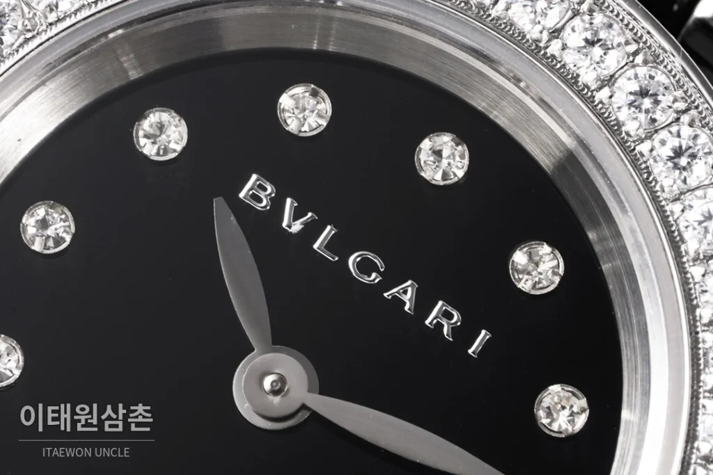 불가리 비제로원 세라믹 브레이슬릿 쿼츠 워치 23mm 블랙 다이얼 실버 베젤
