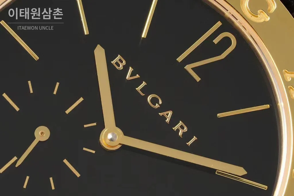 불가리 불가리 로마 스틸 아이보리다이얼 스몰세컨즈 오토매틱 41mm 블랙 가죽 스트랩 골드 베젤