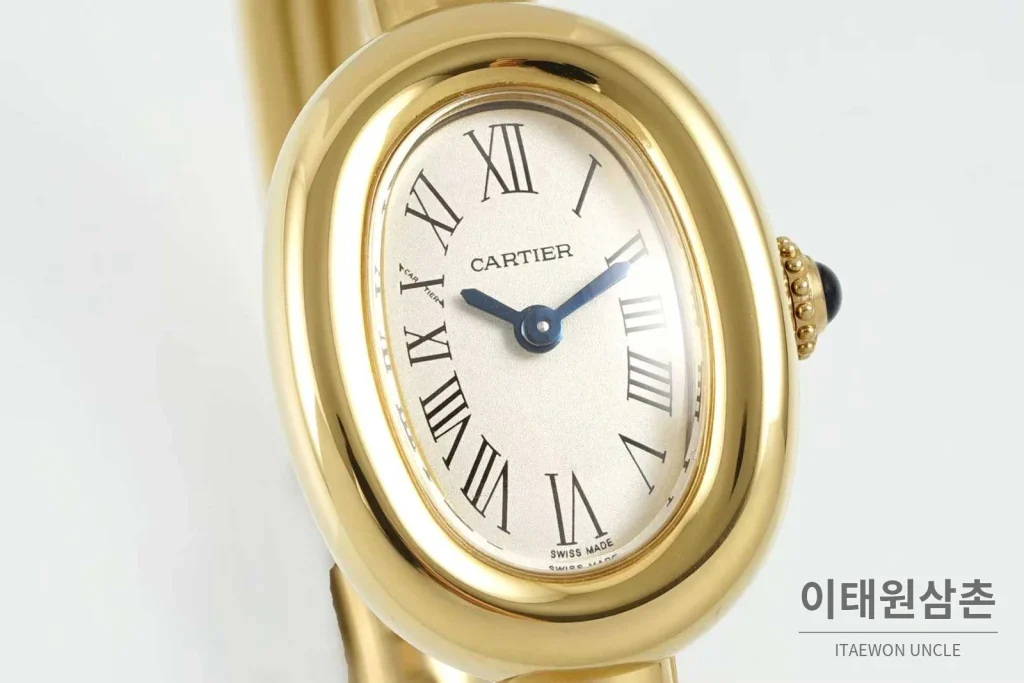까르띠에 베누아 다이아 타원형 화이트다이얼 로만인덱스 블루핸즈 쿼츠 31.4mm 골드 브레이슬릿