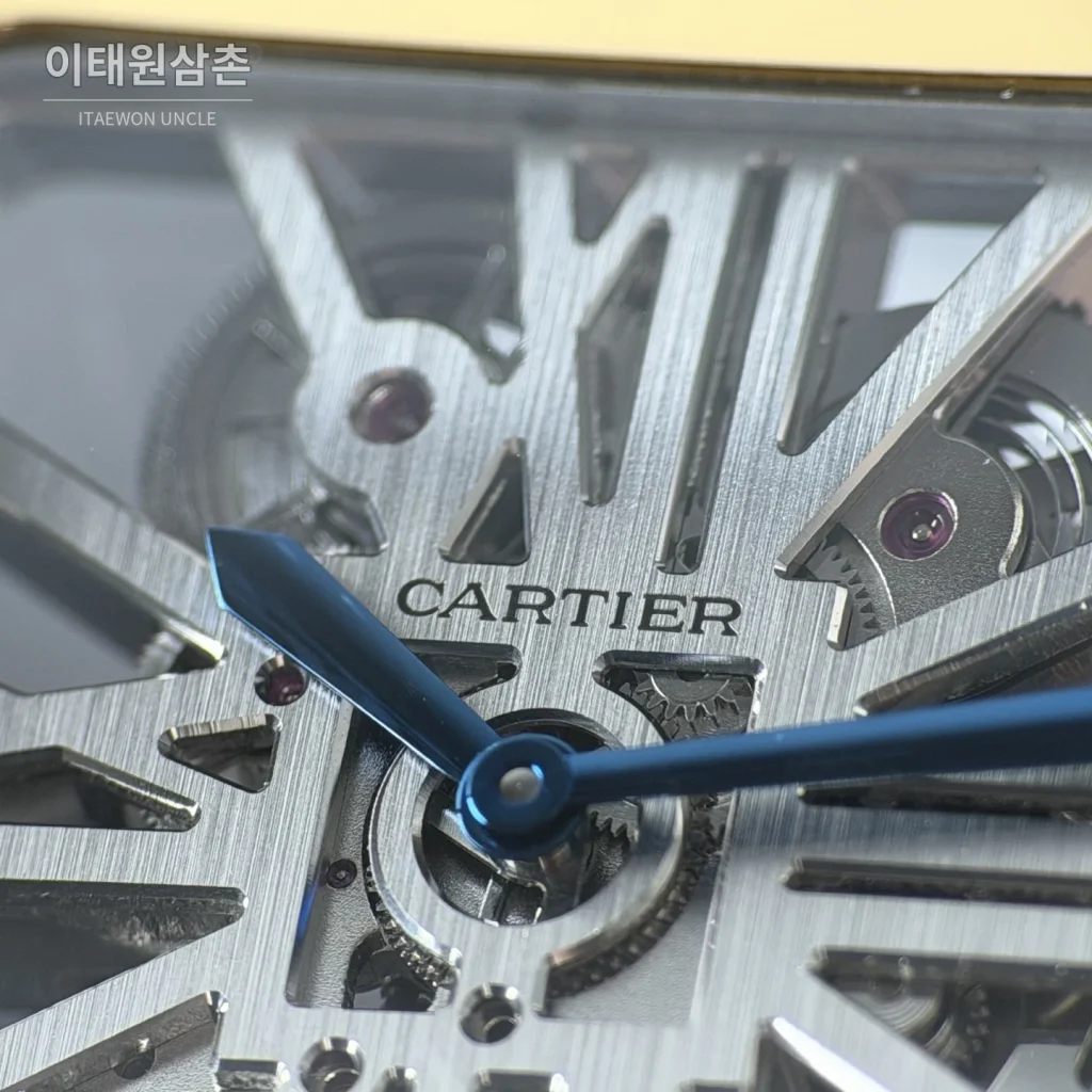 까르띠에 산토스 오토매틱 스켈레톤 다이얼 투톤 브레이슬릿 골드 베젤