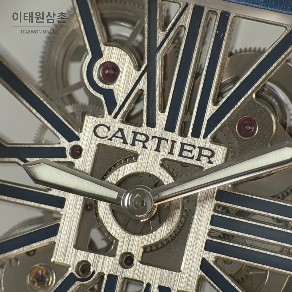 까르띠에 산토스 오토매틱 스켈레톤 다이얼 네이비 가죽 스트랩 네이비 베젤
