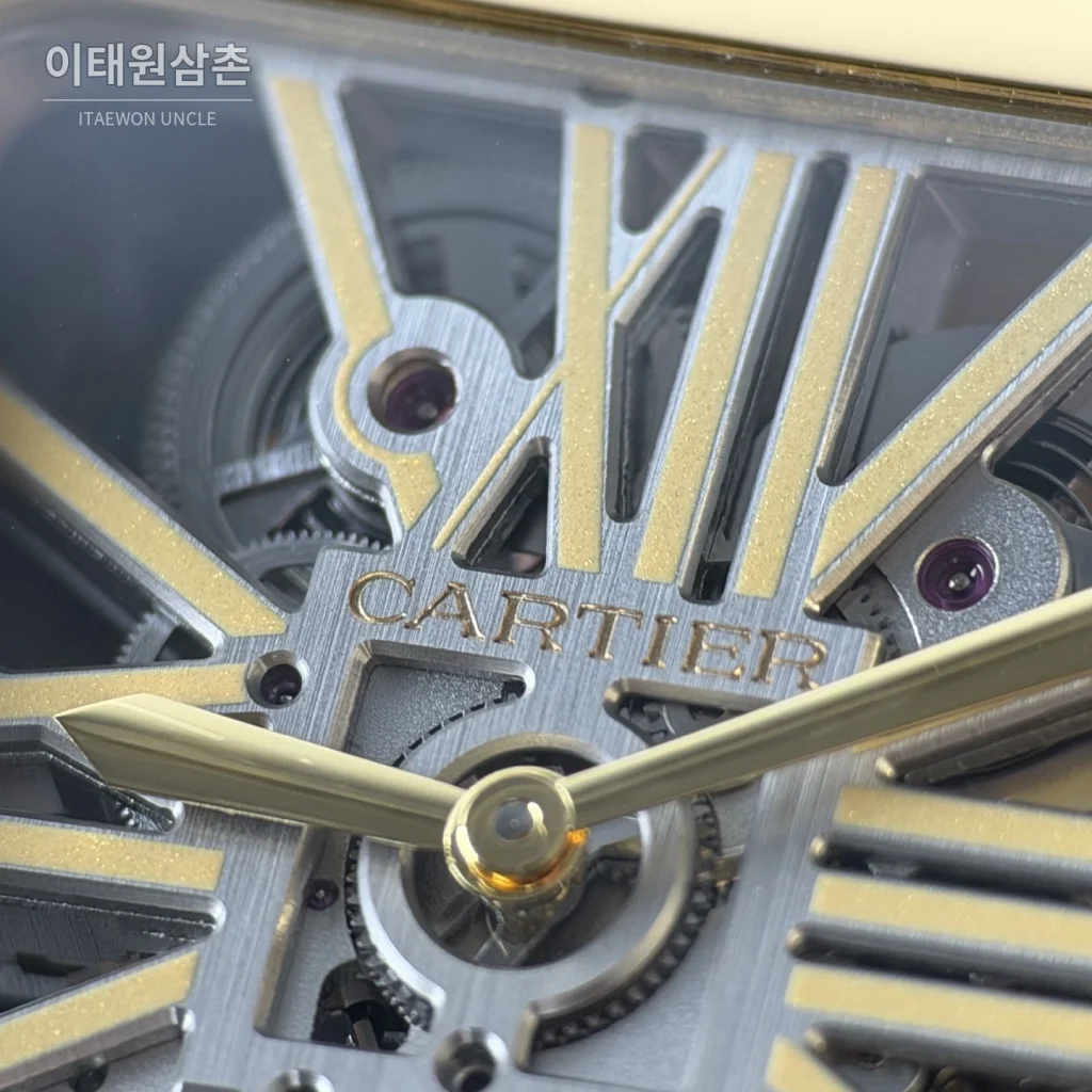 까르띠에 산토스 오토매틱 스켈레톤 다이얼 골드 브레이슬릿 골드 베젤