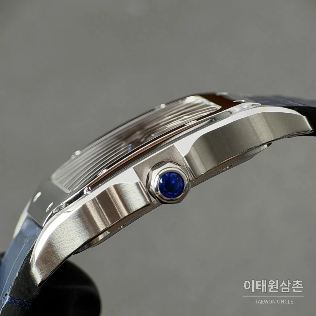 까르띠에 산토스 오토매틱 스켈레톤 다이얼 네이비 가죽 스트랩 실버 베젤