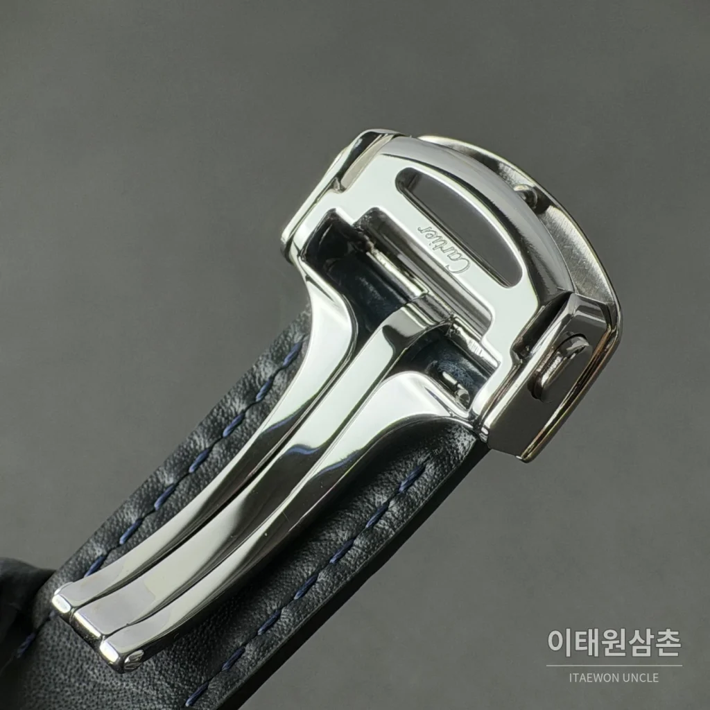 까르띠에 산토스 오토매틱 스켈레톤 다이얼 네이비 가죽 스트랩 실버 베젤