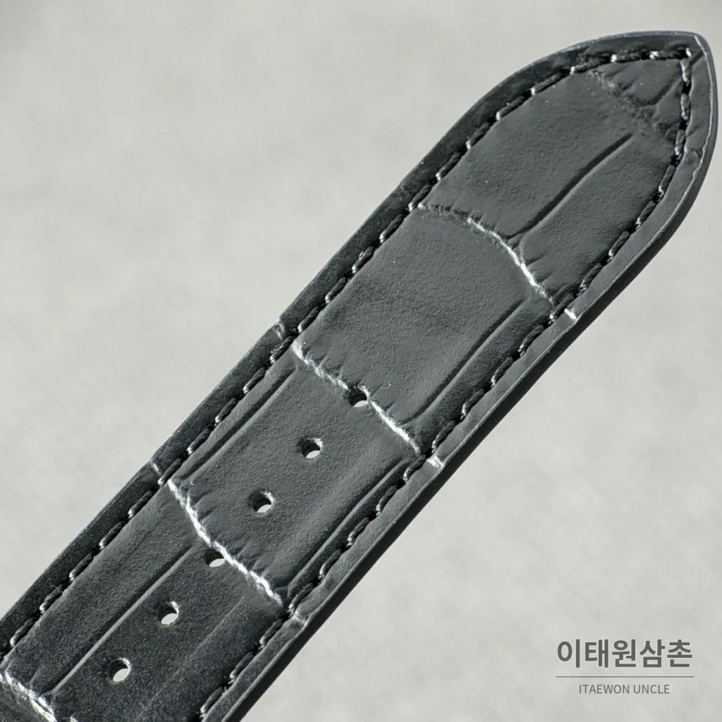 까르띠에 산토스 오토매틱 스켈레톤 다이얼 블랙 러버 스트랩 골드 베젤