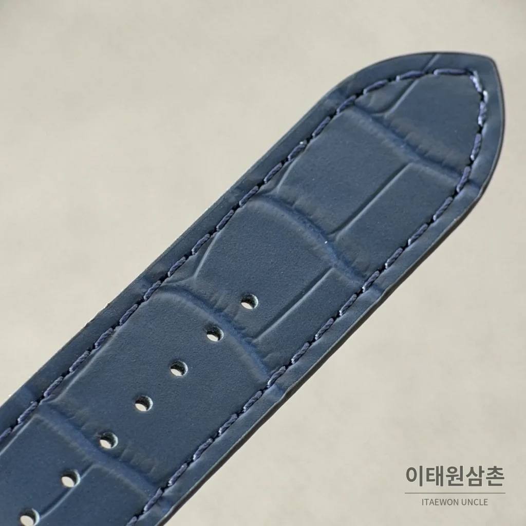 까르띠에 산토스 오토매틱 스켈레톤 다이얼 네이비 가죽 스트랩 실버 베젤