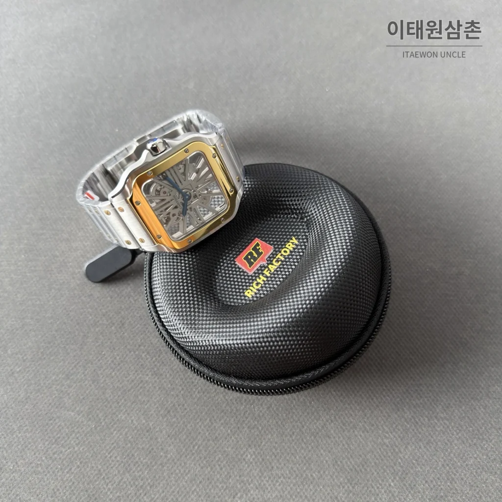 까르띠에 산토스 오토매틱 스켈레톤 다이얼 투톤 브레이슬릿 골드 베젤