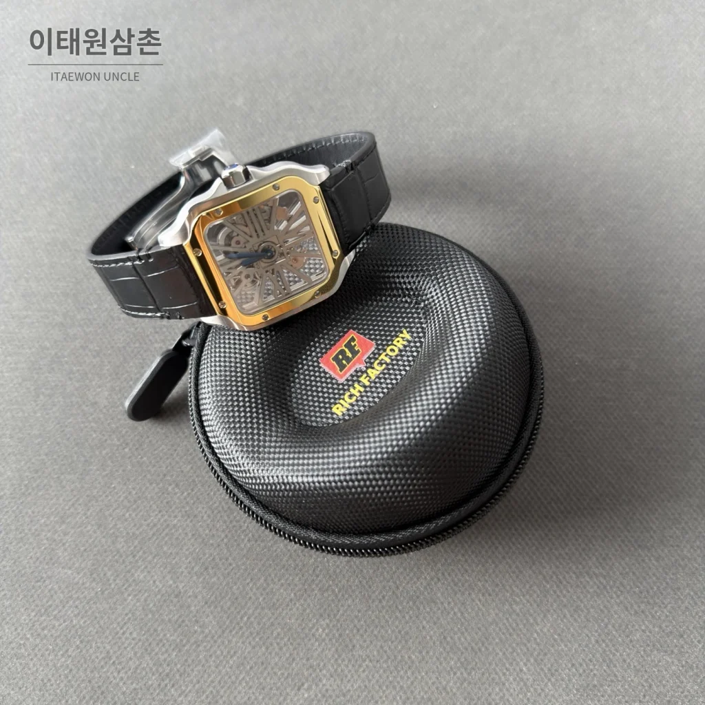 까르띠에 산토스 오토매틱 스켈레톤 다이얼 블랙 가죽 스트랩 골드 베젤
