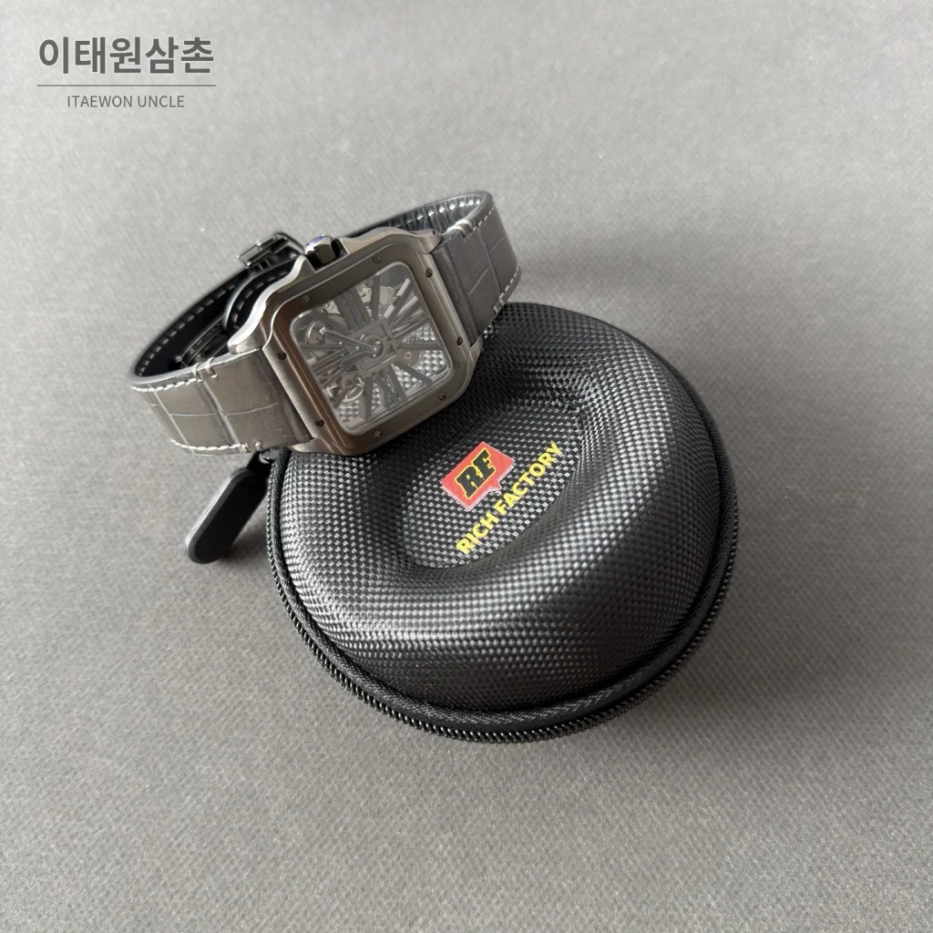 까르띠에 산토스 오토매틱 스켈레톤 다이얼 블랙 가죽 스트랩 그레이 베젤