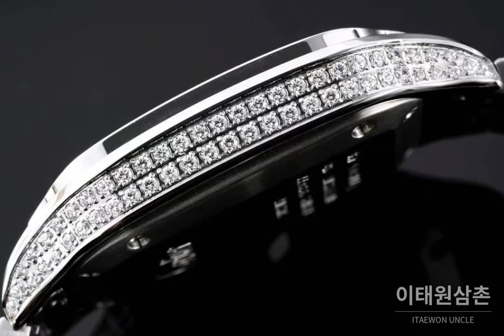 까르띠에 산토스 드 까르띠에 스틸 화이트로만다이얼 오토매틱 35.1mm 스틸 브레이슬릿 실버 베젤