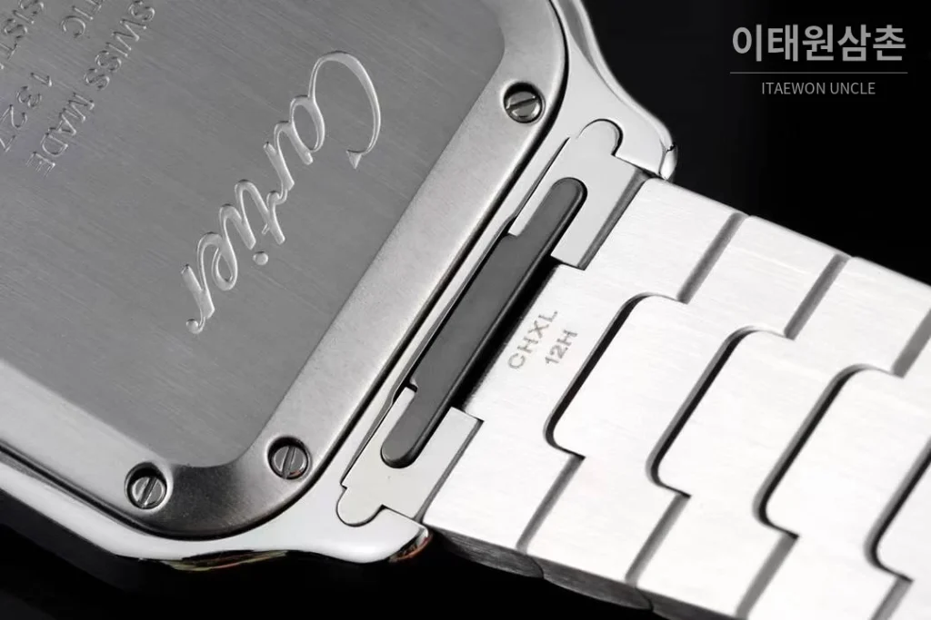 까르띠에 산토스 드 까르띠에 스틸 화이트로만다이얼 오토매틱 35.1mm 투톤 브레이슬릿 골드 베젤