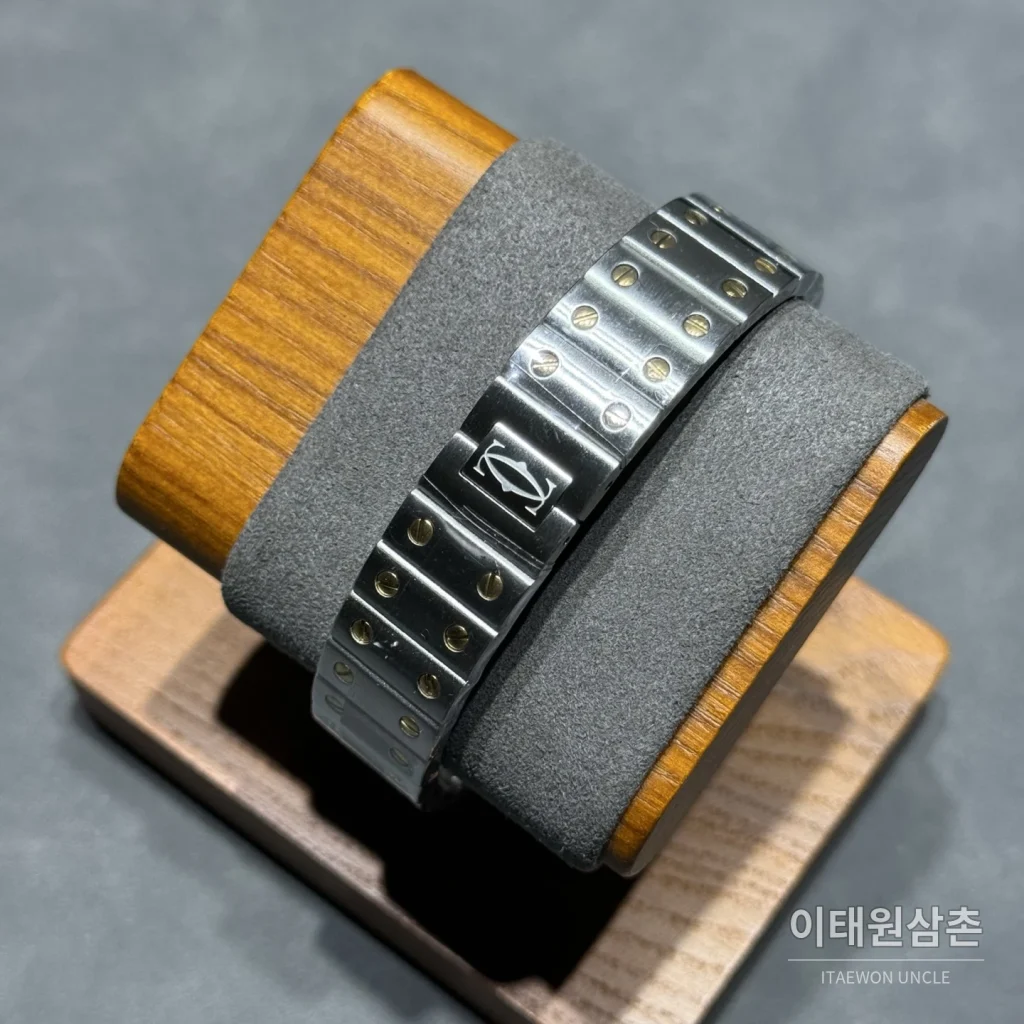 까르띠에 산토스 쿼츠 화이트 다이얼 스틸 브레이슬릿 골드 베젤