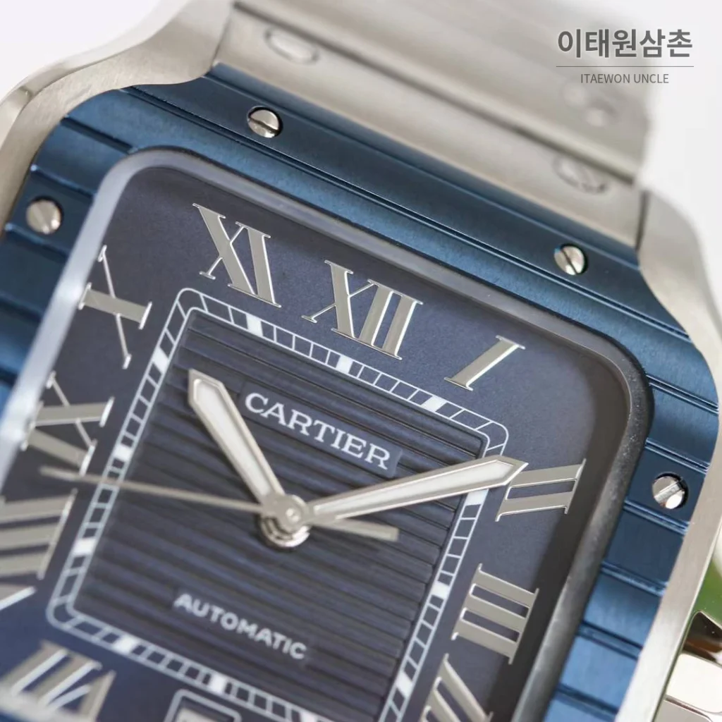 까르띠에 산토스 스틸 블루베젤 러버스트랩 오토매틱 39.8mm 네이비 다이얼