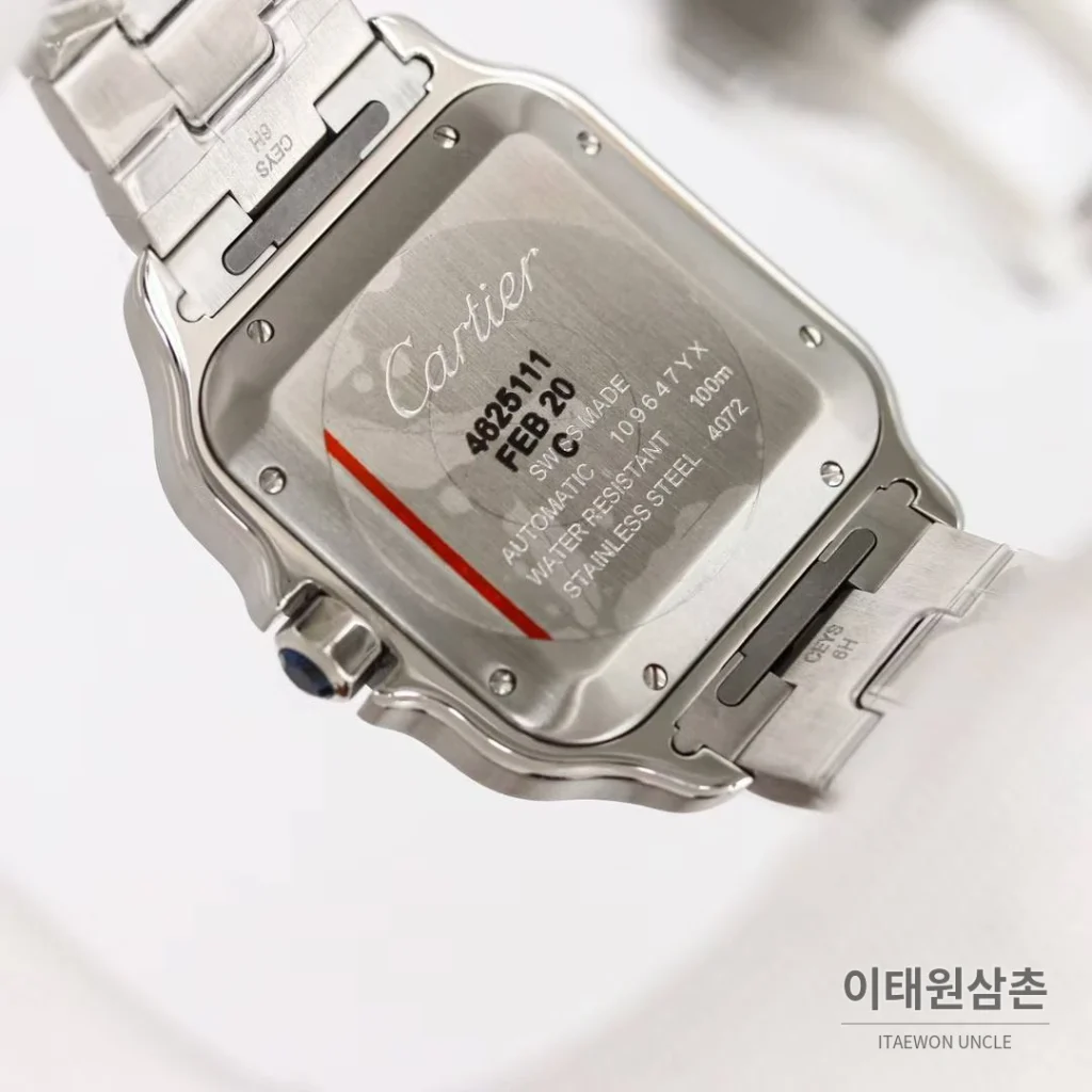 까르띠에 산토스 스틸 블루베젤 러버스트랩 오토매틱 39.8mm 화이트 다이얼