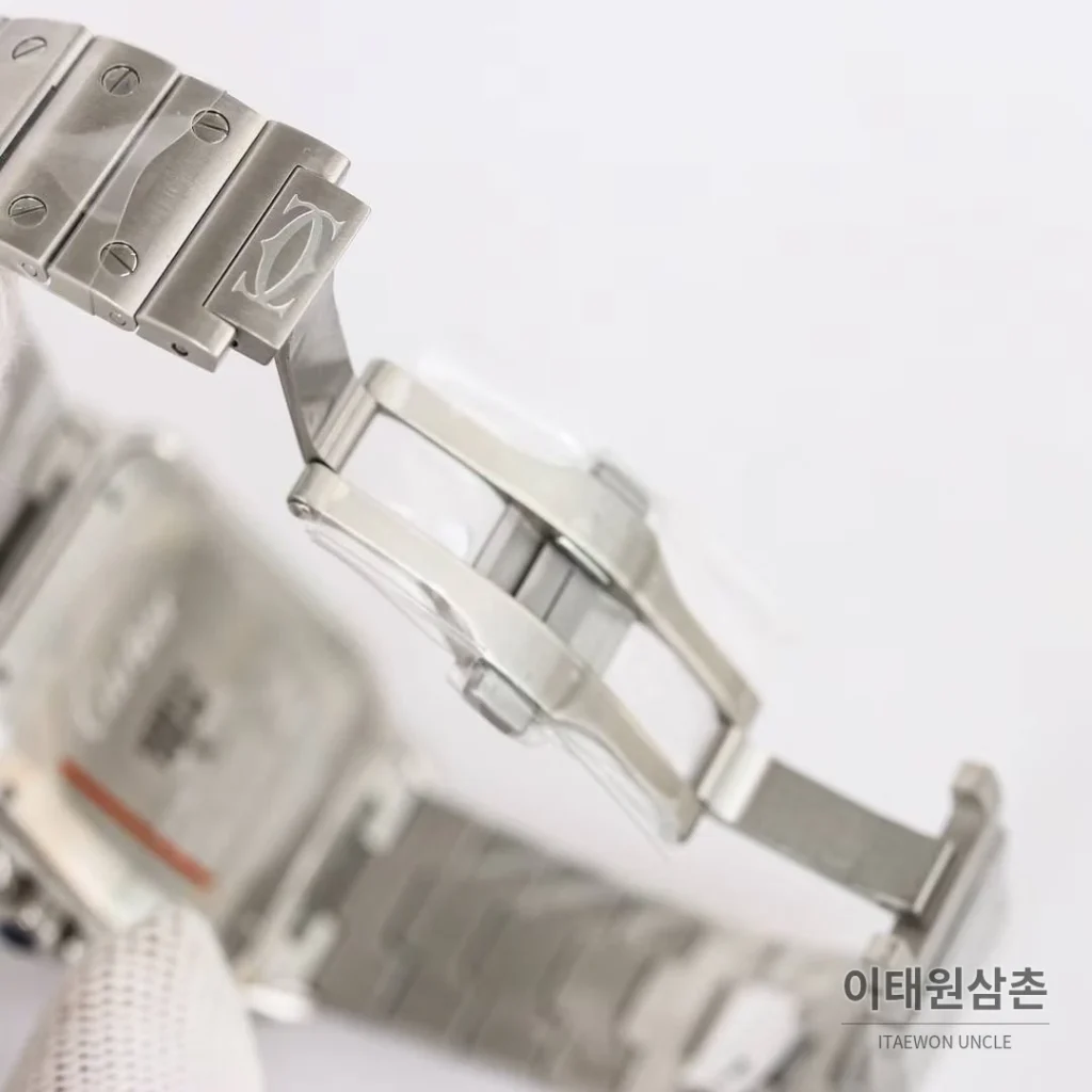 까르띠에 산토스 스틸 블루베젤 러버스트랩 오토매틱 39.8mm 네이비 다이얼
