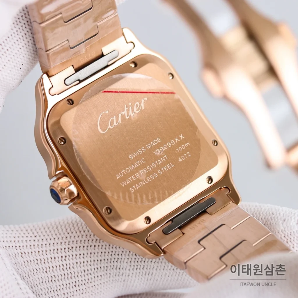 까르띠에 산토스 스틸 블루핸즈 오토매틱 39.8mm 화이트 다이얼 골드 브레이슬릿