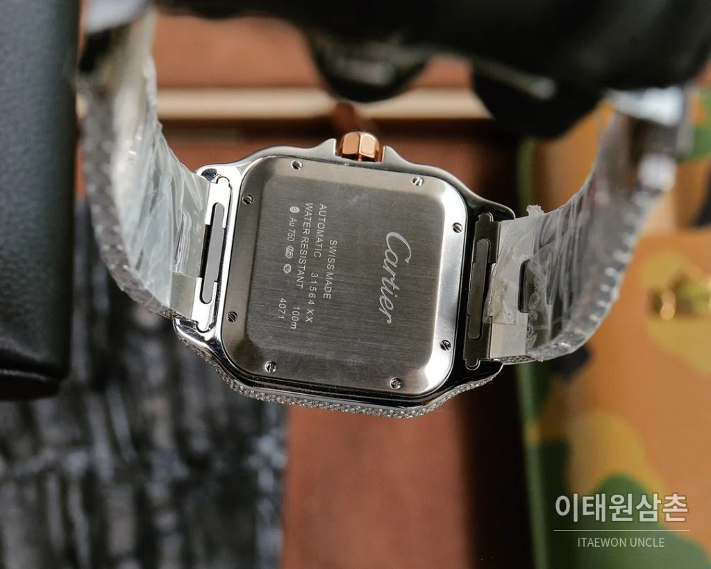 까르띠에 산토스 스틸 풀다이아 블루핸즈 오토매틱 40mm 샴페인 다이얼 스틸 브레이슬릿 로즈골드 베젤