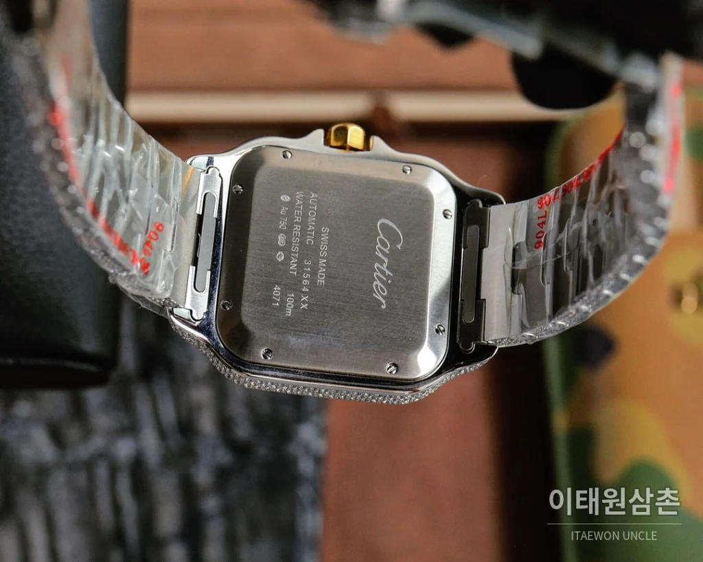 까르띠에 산토스 스틸 풀다이아 블루핸즈 오토매틱 40mm 화이트 다이얼 스틸 브레이슬릿 골드 베젤