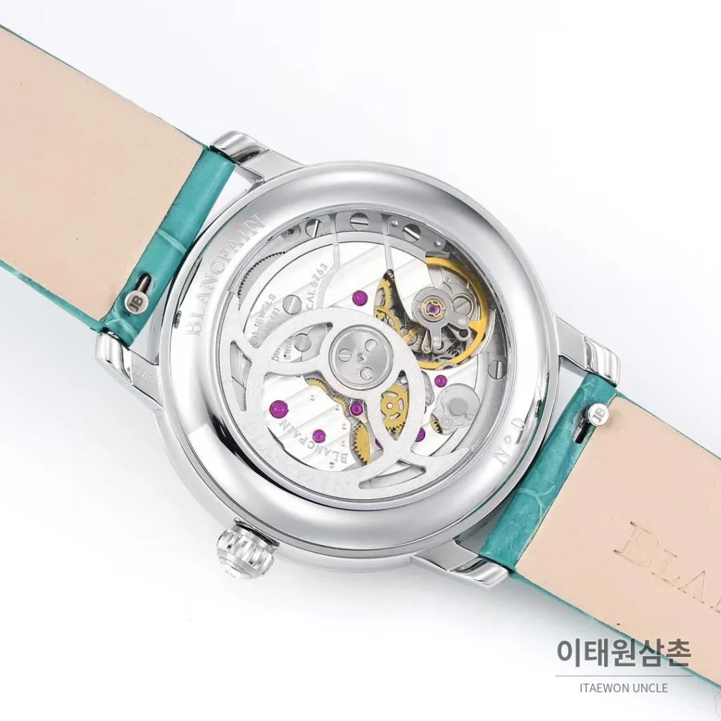 쇼파드 해피스포트 스틸 다이아몬드 자개다이얼 플로팅젬 오토매틱 36mm 화이트 민트 가죽 스트랩 실버 베젤