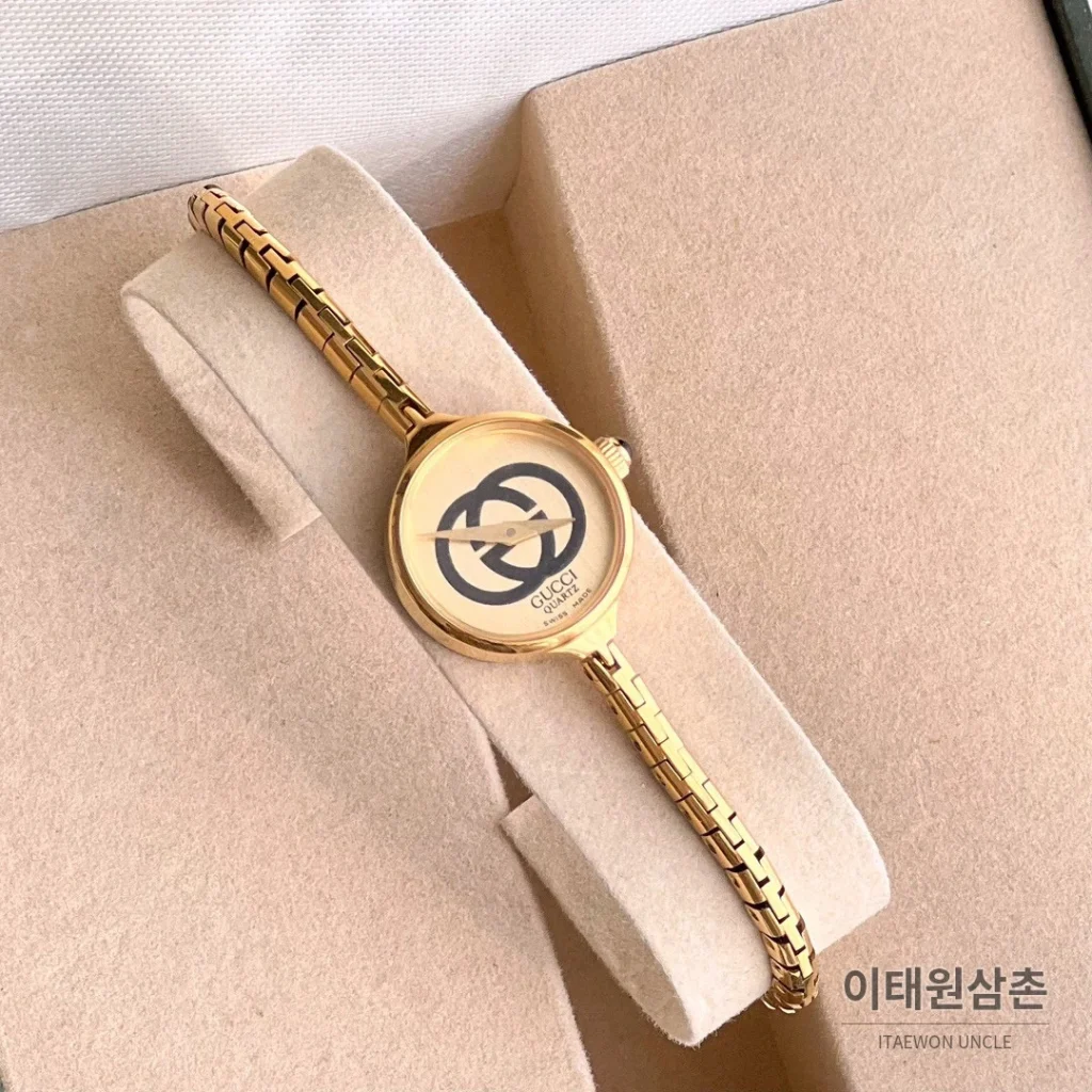 구찌 쿼츠 23mm 샴페인 다이얼