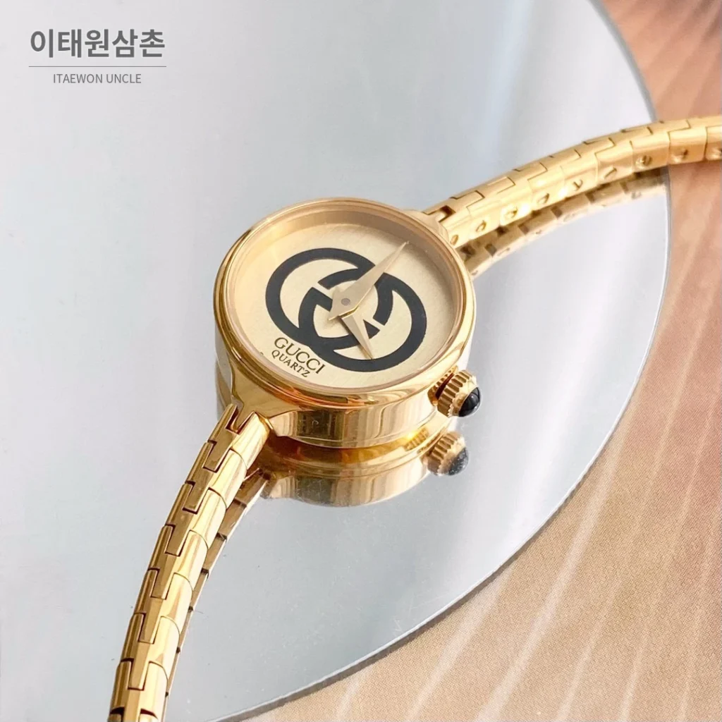 구찌 쿼츠 23mm 샴페인 다이얼