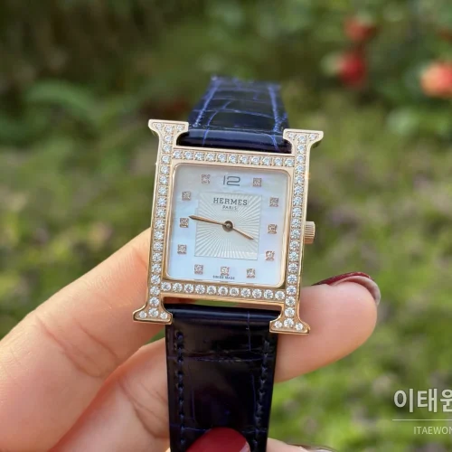 에르메스 H 시리즈 쿼츠 자개 다이얼 네이비 가죽 스트랩 로즈골드 베젤