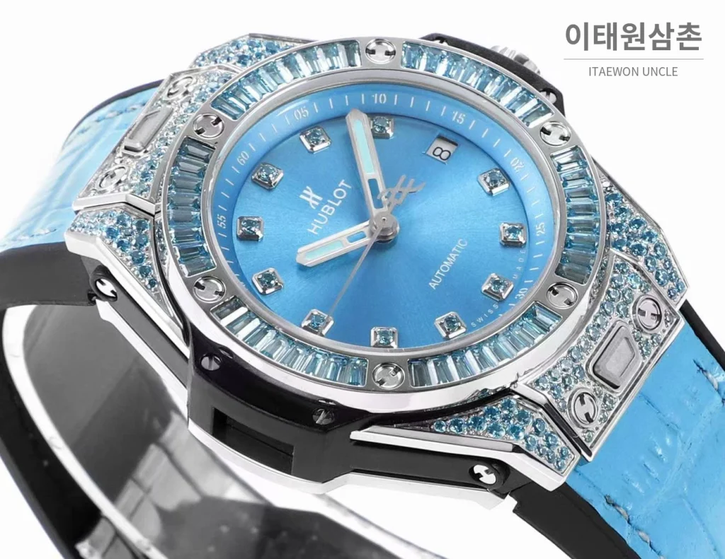 위블로 빅뱅 스틸 레인보우베젤 다이아세팅 오토매틱 39mm 멀티컬러 아이스블루 다이얼 블루 러버 스트랩