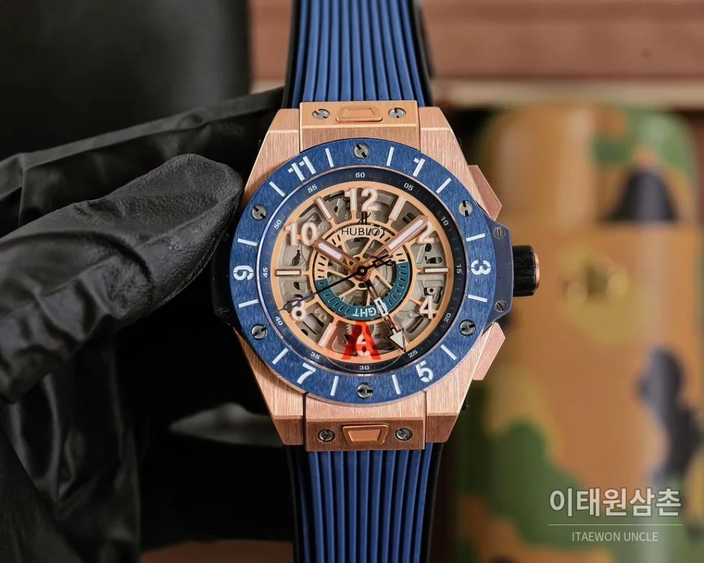 위블로 빅뱅 유니코 GMT 티타늄 골드 오토매틱 45mm 스켈레톤 다이얼 블루 러버 스트랩