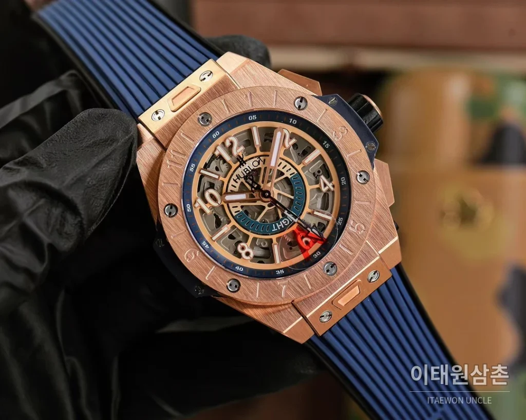위블로 빅뱅 유니코 GMT 티타늄 골드 오토매틱 45mm 스켈레톤 다이얼 네이비 러버 스트랩