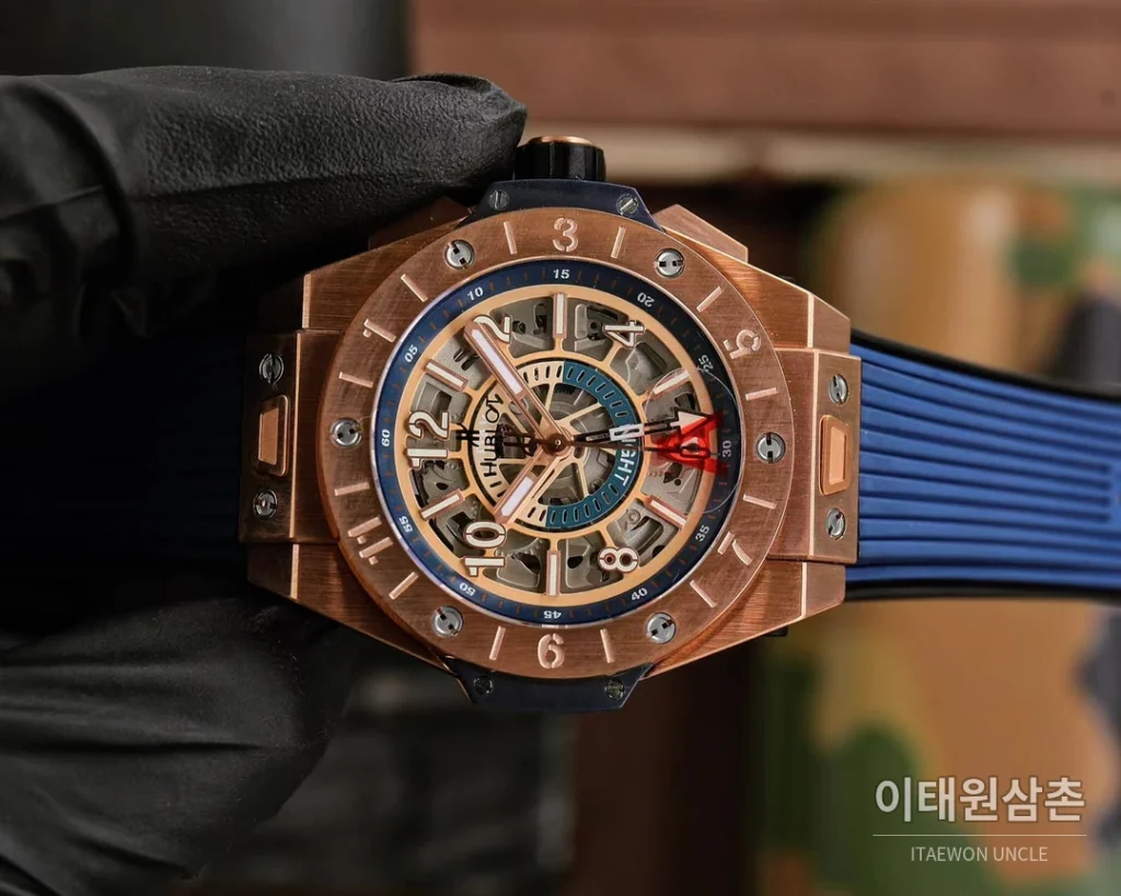 위블로 빅뱅 유니코 GMT 티타늄 골드 오토매틱 45mm 스켈레톤 다이얼 네이비 러버 스트랩