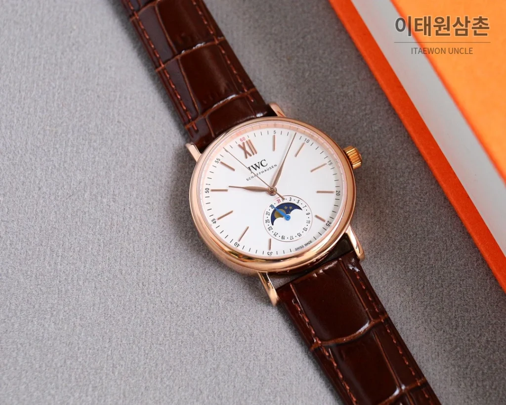 IWC 포르투기저 오토매틱 39mm 블루 다이얼 네이비 가죽 스트랩 로즈골드 베젤